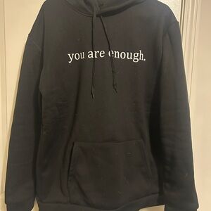 Empowering Black Hoodie with Positive Message